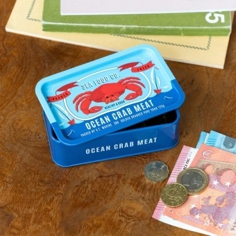 Blue mini storage tin with an illustrated crab on the front.