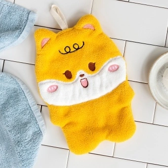 Soft yellow flannel face cloth in a dog shape.