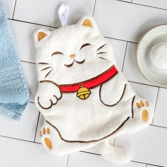 Soft white flannel face cloth in a cat shape design.