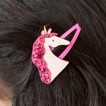 Pair of pink hair clips with glittery unicorn heads