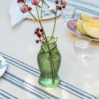 Green glass fish-shaped jug with embossed scales 