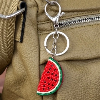 Watermelon slice keyring charm with silver ring and clip.