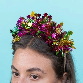 Christmas party headband with colourful tinsel and star.
