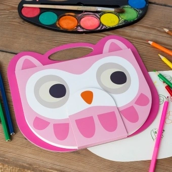 Pink owl-faced sketchbook with a carry handle, large eyes and orange beak.