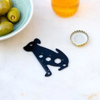 Dog-shaped multi-tool with ruler and wrench cut-outs.