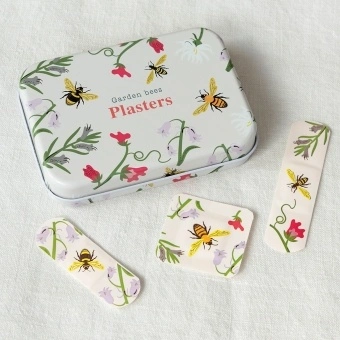 Garden bees plasters in tin with matching bee and floral plasters shown.