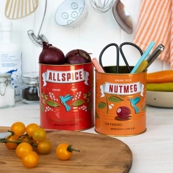 Set of two retro-style storage tins with allspice and nutmeg spice label designs