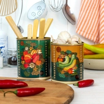 Set of two vegetable broth storage tins with colourful harvest vegetable illustrations
