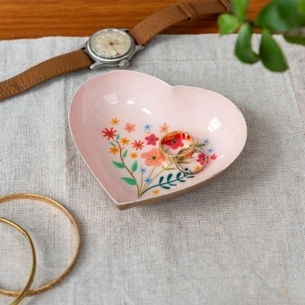 Heart-shaped pink trinket dish with floral design