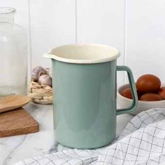 Pistachio green enamel jug with pour spout, white interior and 1.7 litre capacity.
