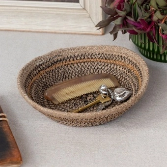 Conical jute bowl in natural, black and brown.