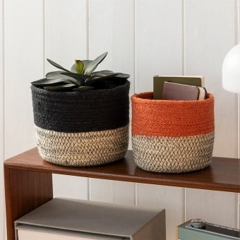 Set of two jute storage baskets in black and orange.