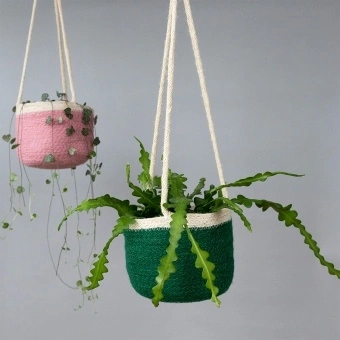 Green seagrass hanging basket with hanging loop.
