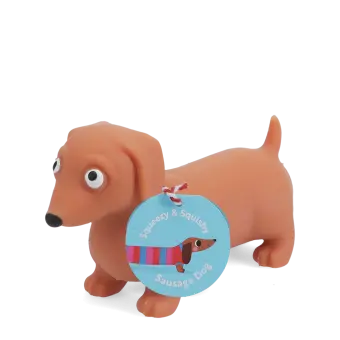 Squeezy squishy toy shaped like a brown sausage dog with floppy ears and a cute face with tag