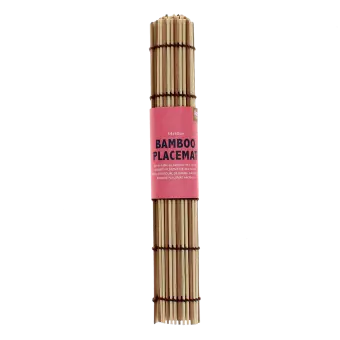 Rolled bamboo placemat secured with a pink label