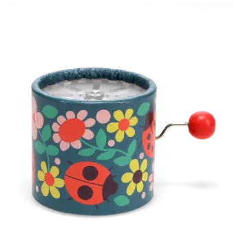 Winding music box with illustrated flowers and ladybird design, featuring a red turning handle.