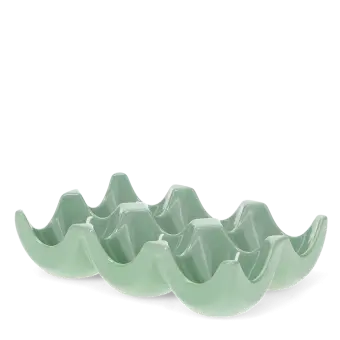 Green ceramic egg holder with six curved compartments for storing eggs