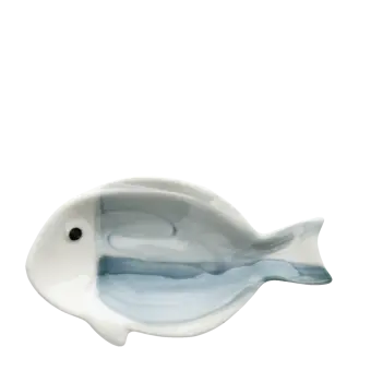 Blue and white ceramic fish‑shaped trinket dish.
