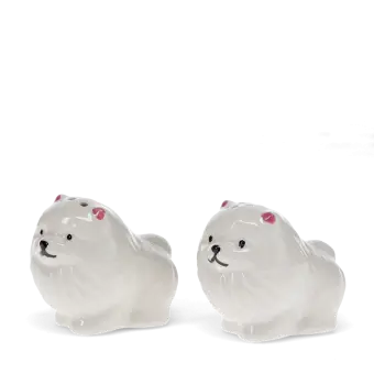 Dog‑shaped ceramic salt and pepper shakers .