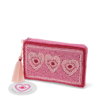 Pink beaded purse with three heart designs and a pale pink tassel with tag.
