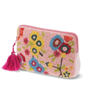Pink beaded makeup bag with colourful floral designs and a bright pink tassel.