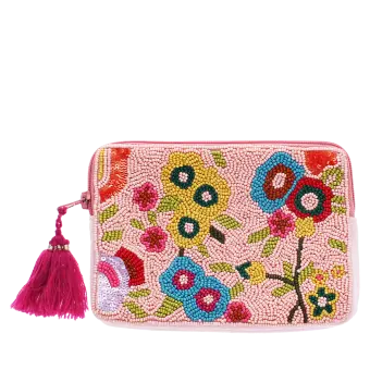 Pink beaded makeup bag with colourful floral designs and a bright pink tassel.