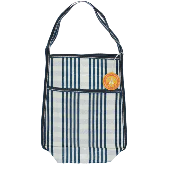 Blue and white striped woven bag with a front pocket, shoulder strap and a tag.