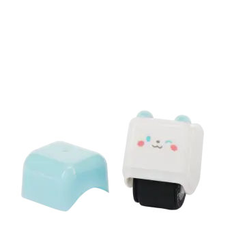 Puppy-themed roller stamp with the cap removed.