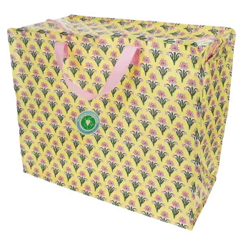 Yellow jumbo storage bag with a pink floral pattern and pink handles with tag.