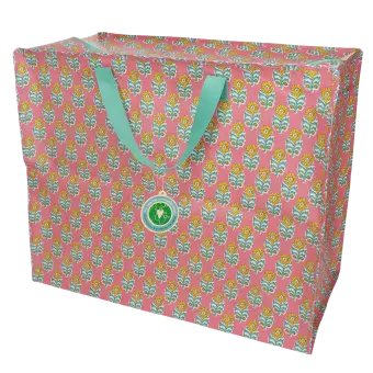Pink jumbo storage bag with colourful floral designs with tag.