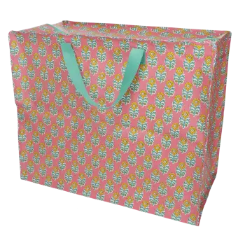 Pink jumbo storage bag with colourful floral designs.