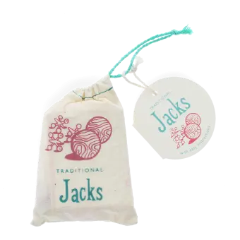 Traditional Jacks in a drawstring bag with a round tag attached.