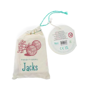 Traditional Jacks in a drawstring bag with a tag showing safety warnings.