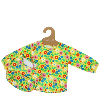 Bright floral bib and vest set on hanger with matching colourful pattern
