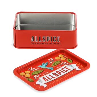Open red mini storage tin with the lid beside it, featuring an illustrated all spice on the lid.