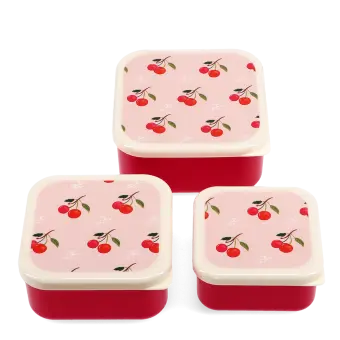 Set of three red snack boxes with cream lids featuring a cherry print.
