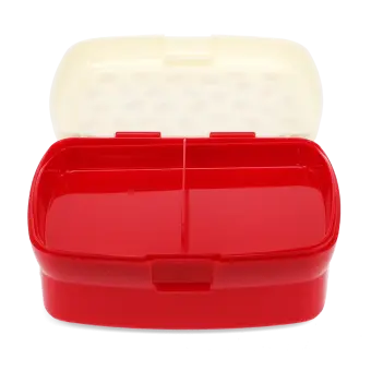 Open red lunch box with a cream lid and two interior compartments tray.