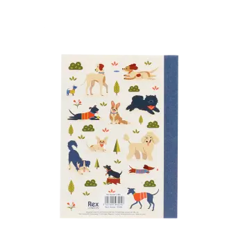 A6 notebook with illustrated dogs in a park scene on the back cover.