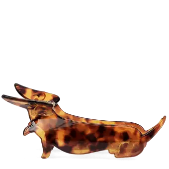 Hair claw clip featuring an adorable sausage dog design in translucent brown, with a marbled effect. 