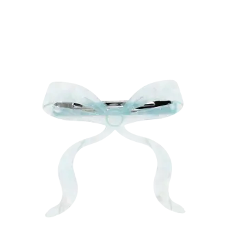 Hair clip featuring a pretty bow design in blue, with hints of marbling and translucence. 