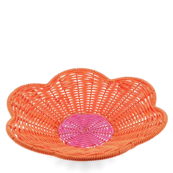 A shallow orange woven plastic basket with a flower-shaped rim and a pink centre.