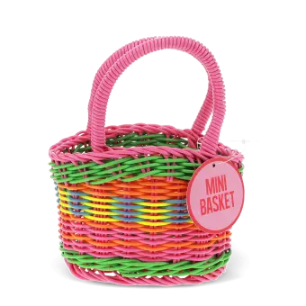 A small woven plastic basket with a pink handle and multicoloured striped body with tag.