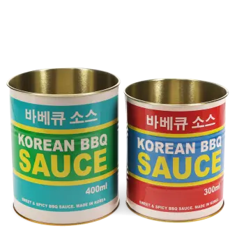 Two colourful Korean BBQ sauce storage tins