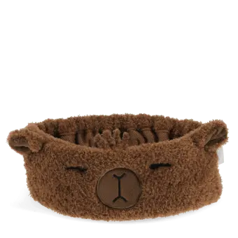 Soft and cosy headband, featuring the friendly face of a capybara. 