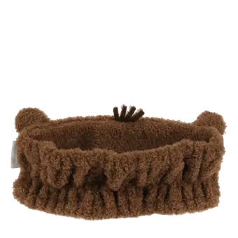 Soft and cosy headband, featuring the friendly face of a capybara. 