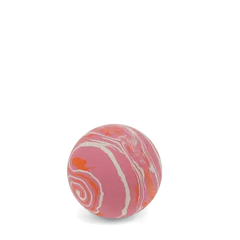 Pink bouncy ball with white and orange swirling pattern.