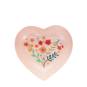 Heart-shaped pink trinket dish with floral design