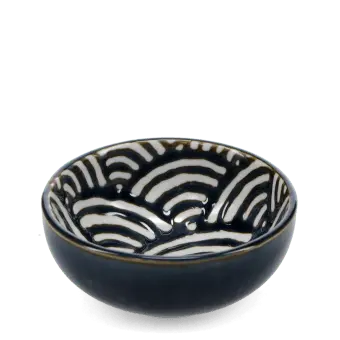 Round ceramic bowl with white wave pattern interior