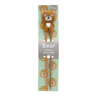 Bear training chopsticks with character topper in retail packaging.
