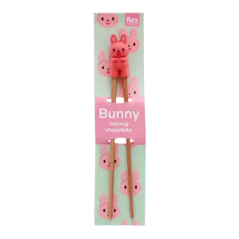 Rabbit training chopsticks with character topper in retail packaging.